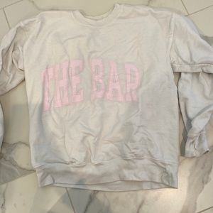 “The bar” sweatshirt. White with light pink writing